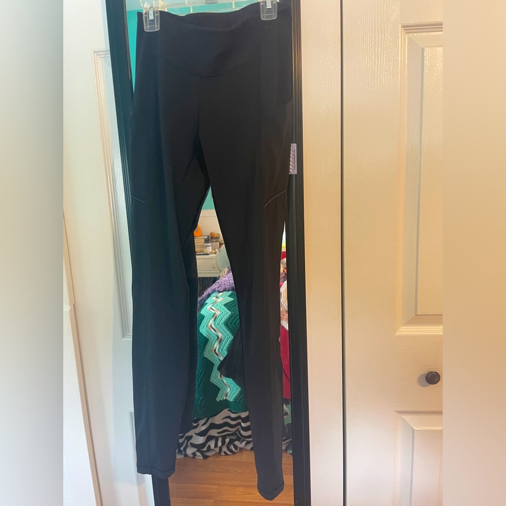 Lululemon athletic full length leggings with pockets. Good condition.
